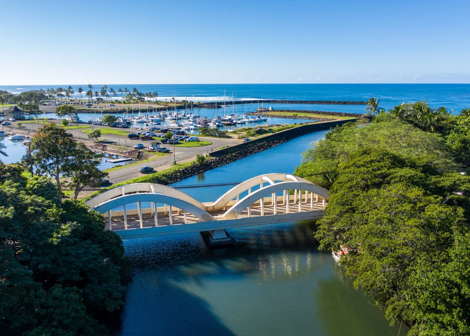 Kayaking on the Anahulu River beneath Haleiwa Bridge on Oahu's North Shore